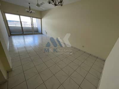 فلیٹ 2 غرفة نوم للايجار في الكرامة، دبي - شقة في بناية عالية الكرامة 2 غرف 60399 درهم - 5609249