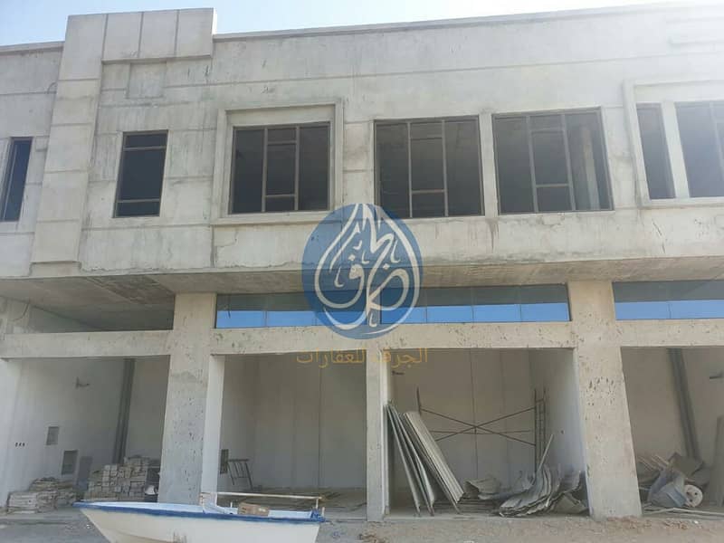 Building for sale in Ajman, Al Rawda area, residential and commercial, freehold