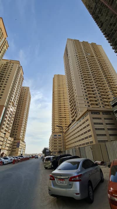 2 Bedroom Apartment for Rent in Emirates City, Ajman - SPACIOUS OPEN VIEW TWO BHK WITH PARKING IN LILIES TOWER AJMAN