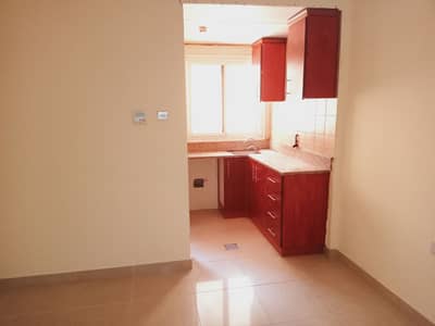 Studio for Rent in Muwailih Commercial, Sharjah - Close kitchen studio available good location family home central ac Muwaili