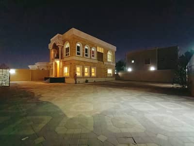 Two-storey villa for rent in Ajman, Al Hamidiya area, large yard, with back