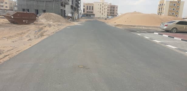 Plot for Sale in Al Alia, Ajman - For sale a plot of commercial land in the alealia area