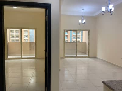 1 Bedroom Apartment for Rent in Emirates City, Ajman - Open View American Kitchen Spacious Flat for Rent in Lilies tower 16000 with parking