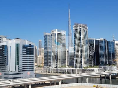 Vacant Studio With Balcony Facing Canal and Burj Khalifa, Prime Location, Safeer Tower 2, Business Bay