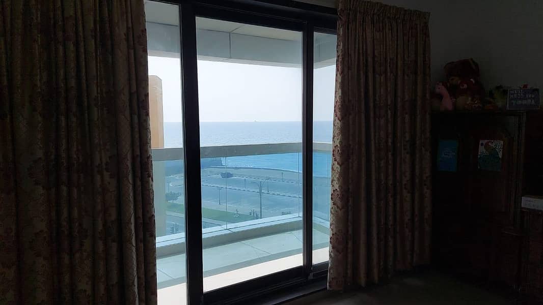 Full Sea view 3 BHK Available For Sale In Corniche Tower Ajman with 2 Car Parking