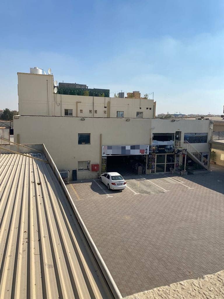 Industrial property for sale in new sanaia / Ajman on the main road ground + mezzanine