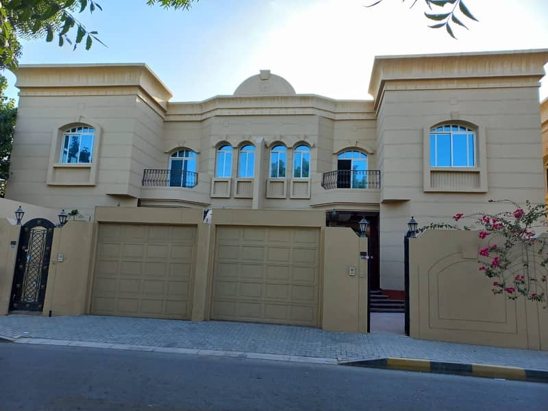 For rent a two-storey villa in Sharjah, Sharqan area, an area of ​​​​10,000