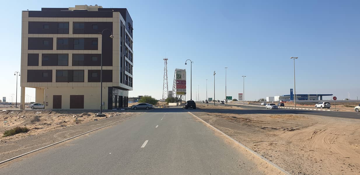 For sale two plots of commercial land in Yasmeen on Sheikh Zayed Road