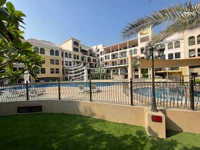 1 Bedroom Apartment for Sale in Jumeirah Village Circle (JVC), Dubai - Well Maintained | Private Garden | Facing Pool 1BR