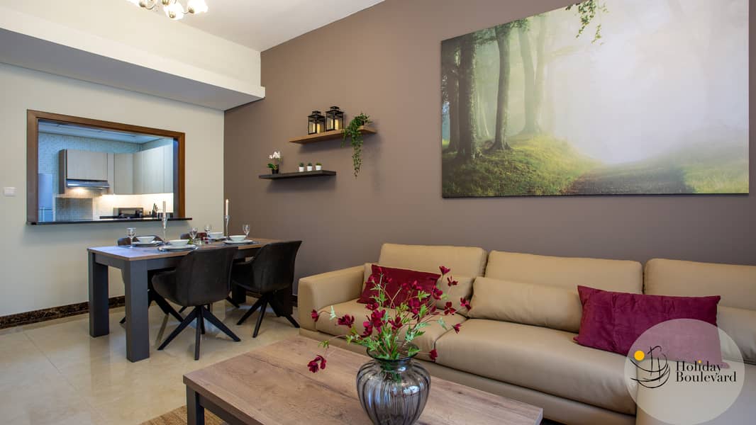 4 Brown sofas well themed room