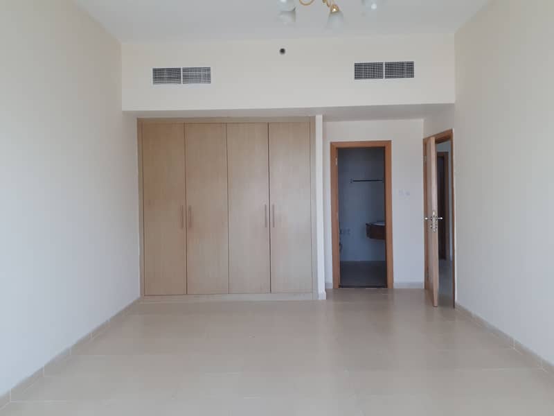1 month free spacious 1bhk with wardrobe gym pool and all facility in Dubai land rent 32k in 4 Cheque payment