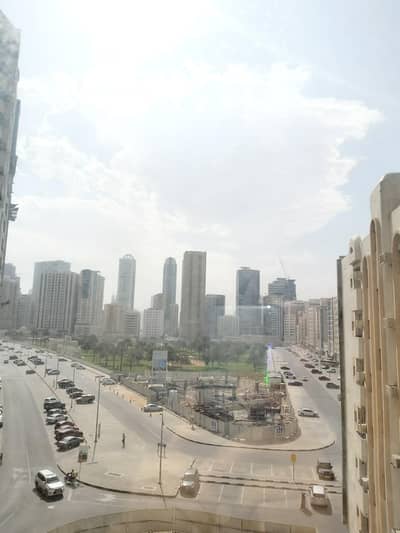 2 Bedroom Flat for Rent in Al Majaz, Sharjah - Chiller Free Spacious 2BR APARTMENT with AMERICAN KITCHEN IN JUST 34,000