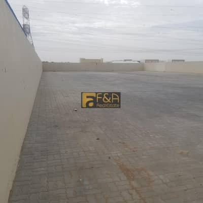 Plot for Rent in Industrial Area, Sharjah - Open land with boundary wall Ideal for storage
