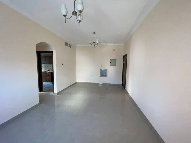 For rent in Ajman, apartments, a room, a hall, and studios in the Al-Jurf area, opposite the court, and a communications company, excellent spaces