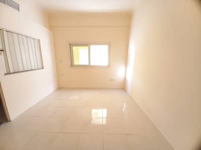 Studio for Rent in Al Qulayaah, Sharjah - Specious Studio like a new building Ready to move sprate kitchen central ac central gas just in 11k