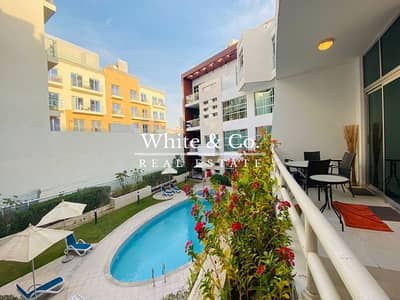 1 Bedroom Apartment for Rent in Jumeirah Village Circle (JVC), Dubai - Pool View | Brand New Furnishing | Option with Utilities