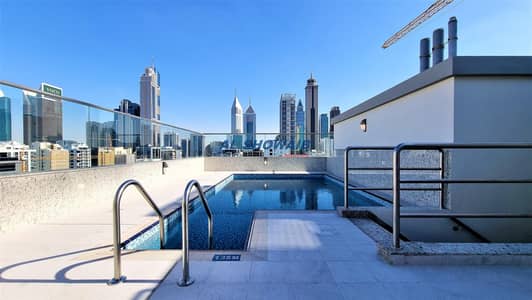 شقة 2 غرفة نوم للايجار في السطوة، دبي - شقة في بناية أستوريا السطوة 2 غرف 52000 درهم - 5658388