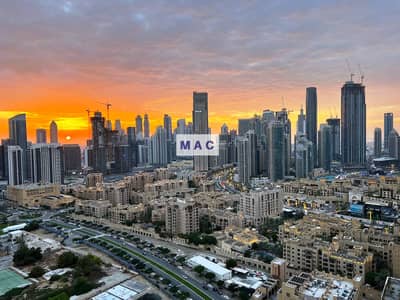 2 Bedroom Flat for Rent in Downtown Dubai, Dubai - High floor, sunset-view | Fabulous 2  BR | Chiller free  - Burj Views