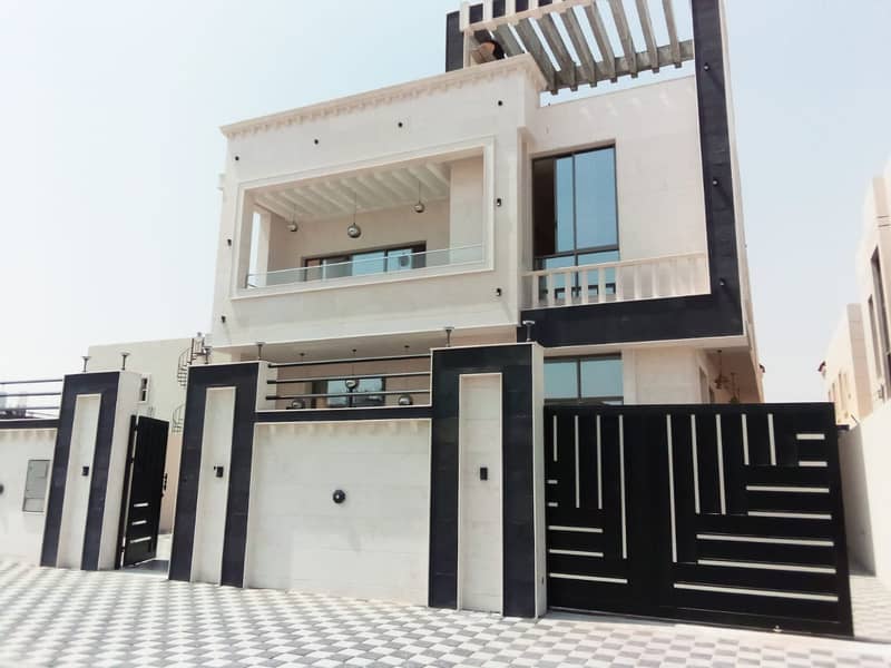 For sale a villa in Al-Alia, Ajman, if you can buy and own a large villa in installments with the same rent value only, freehold for all nationalities