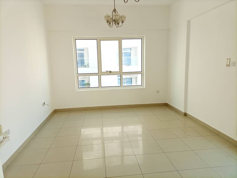 Spacious 2Bhk Flat Very Close To RTA Bus Stop With Centralize AC,2 Balconies,Parking Free, Gym And Swimming pool Just in 40K