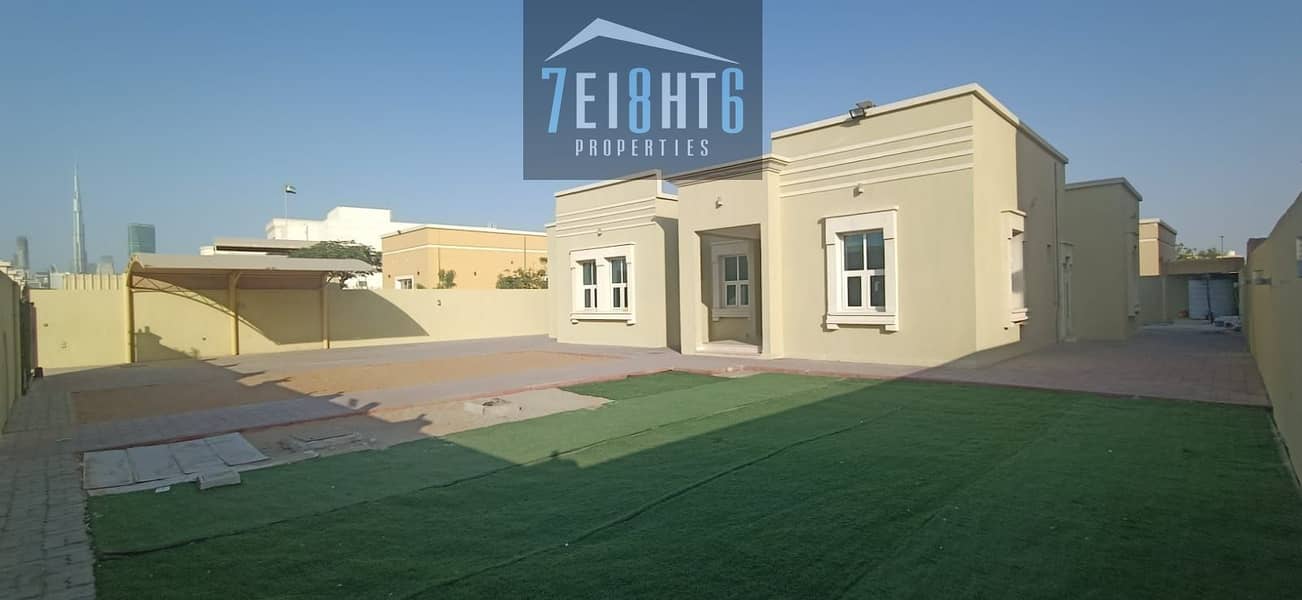 Outstanding property:  3 b/r good quality independent villa + maids room + large landscaped garden for rent in Al Quoz 2