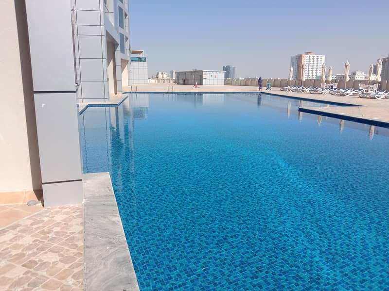 AJMAN BEACH CITY VIEW LUXURY NEW ONE BEDROOM WITH FREE AC, PARKING, SWIMMING POOL, AND GYM