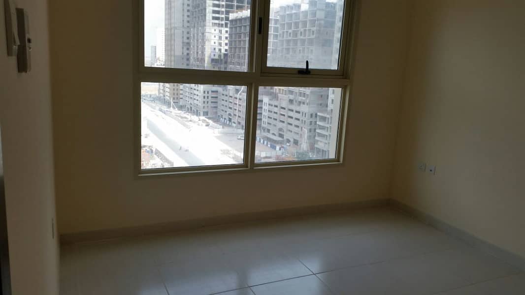 SPACIOUS 1 BHK FLAT (size 920 sqft) WITH PARKING AVAILABLE FOR RENT IN LILIES TOWER- EMIRATES CITY AJMAN