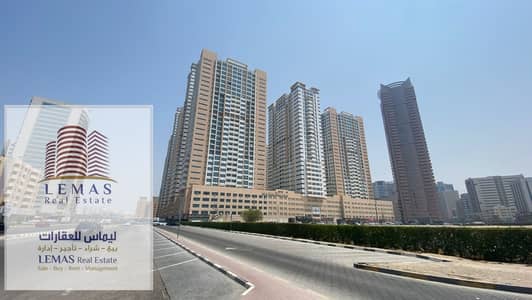 2 bhk close kitchen garden view with parking for rent in Ajman one tower.