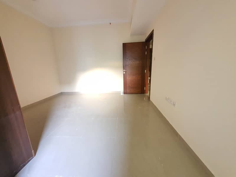 1month free offer. . . . spacious 1bhk with big balcony, wardrobe, parking in new muwaileh.