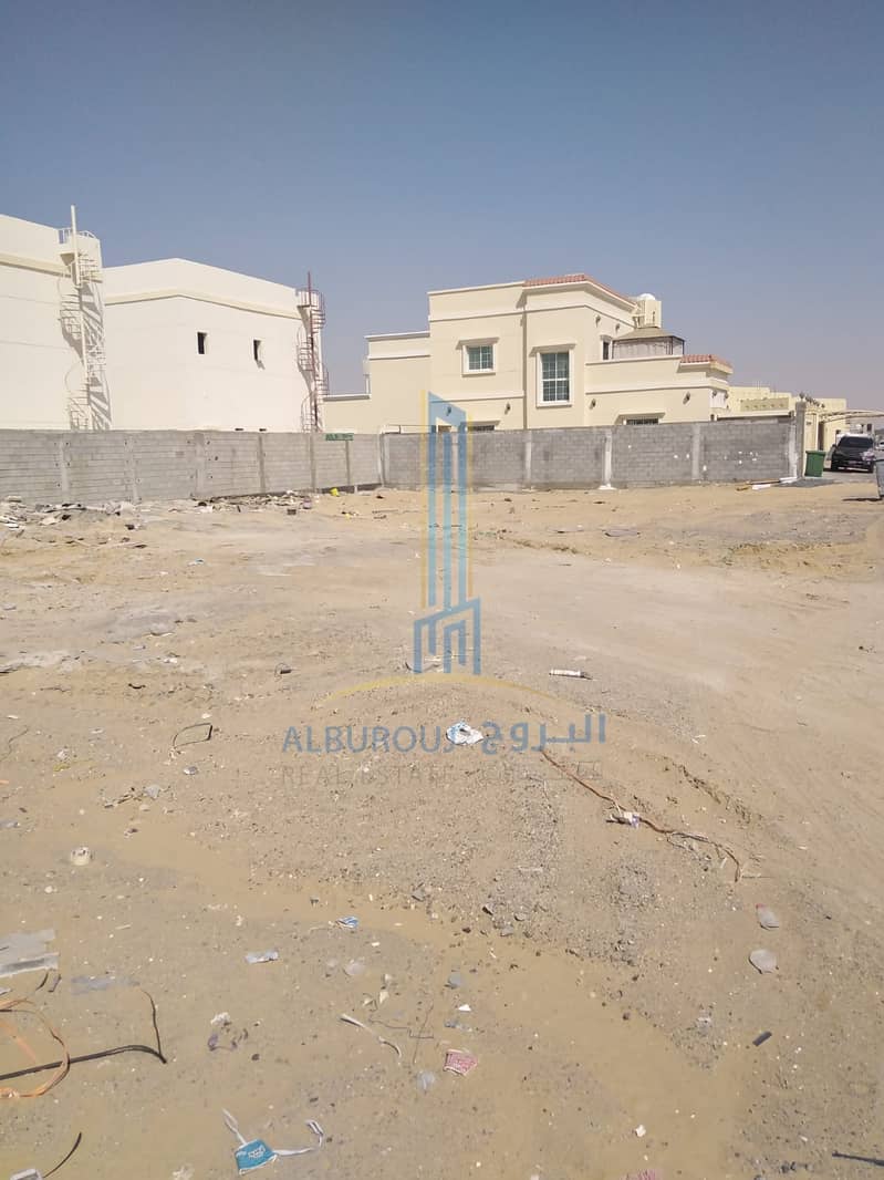 A residential plot for sale in Al Zahya , no registration fees! no Ownership fees!