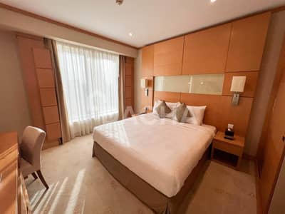 شقة 2 غرفة نوم للايجار في شارع الشيخ زايد، دبي - شقة في فندق كارلتون داون تاون شارع الشيخ زايد 2 غرف 139998 درهم - 5712542