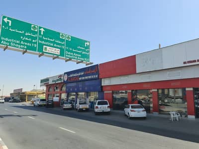 Shop for Rent in Industrial Area, Sharjah - Shop for rent on a main street, great location and price