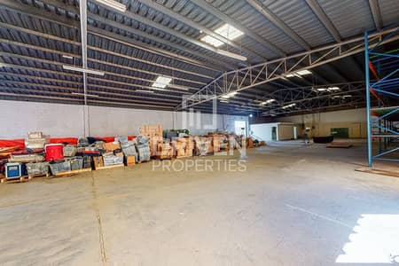 Warehouse for Sale in Al Quoz, Dubai - Standalone Open Yard Warehouse | Rented