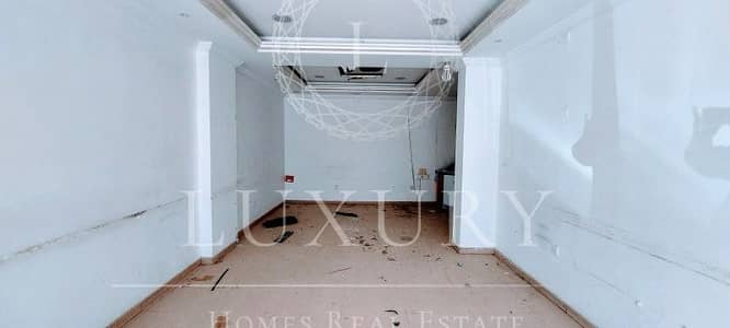 Shop for Rent in Central District, Al Ain - Commercially Zoned Featuring With Main Street View