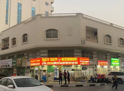Building for Sale in Al Rashidiya, Ajman - Building for sale in Rashidiya corner on two corner streets