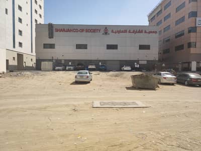 Mixed Use Land for Sale in Al Qulayaah, Sharjah - Sale yard of mixed land for residential and commercial use in the castle, a privileged location
