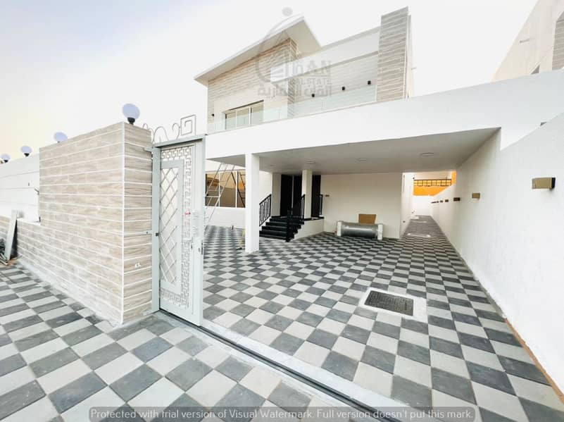 For sale Ajman, Al Rawda area, a new villa, modern finishing, a very special location