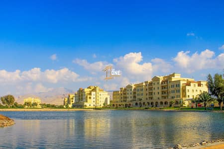 1 Bedroom Flat for Sale in Yasmin Village, Ras Al Khaimah - Stunning Lake View I 1 Bedroom I Terrace Apartment