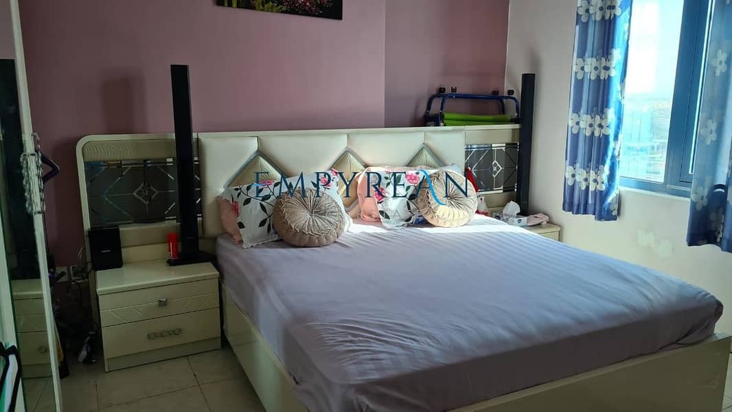 Garden view Semi Furnished 2 BR | 2 car parking | chillers free