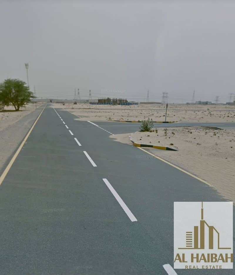 For sale residential land in Sharjah, Al Hoshi area, great location Two-street corner