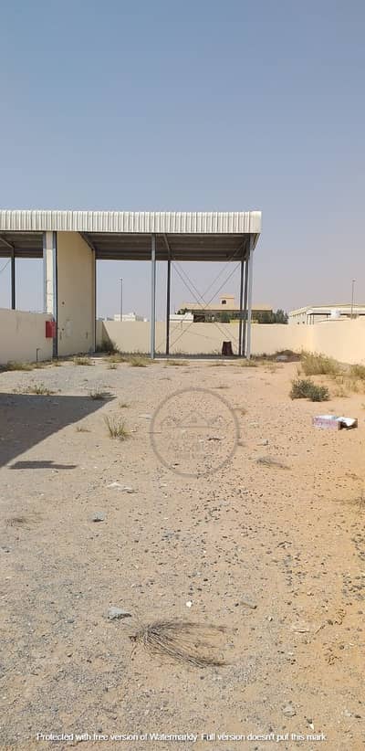 Mixed Use Land for Rent in Al Sajaa, Sharjah - LAND WITH 2 ROOMS AND BOUNDARY WALLS FOR RENT