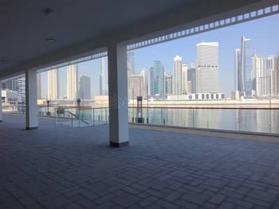 محل تجاري  للايجار في الخليج التجاري، دبي - محل تجاري في ميلينيوم بن غاطي ريزيدنسز الخليج التجاري 250000 درهم - 5818528