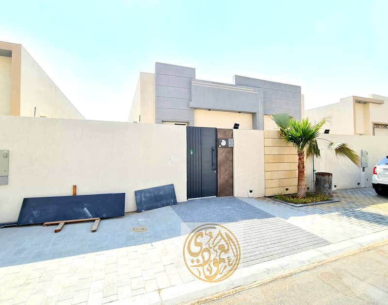 Villa for sale, great location, close to Sheikh Mohammed bin Zayed Street, distinctive modern design, freehold for all nationalities, without service