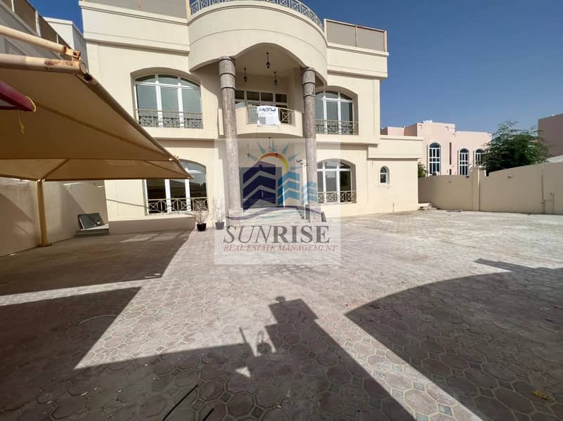 For rent in Khalifa City A, an independent villa, 8 rooms, a Majlis, two halls, and two halls, an external kitchen, an i