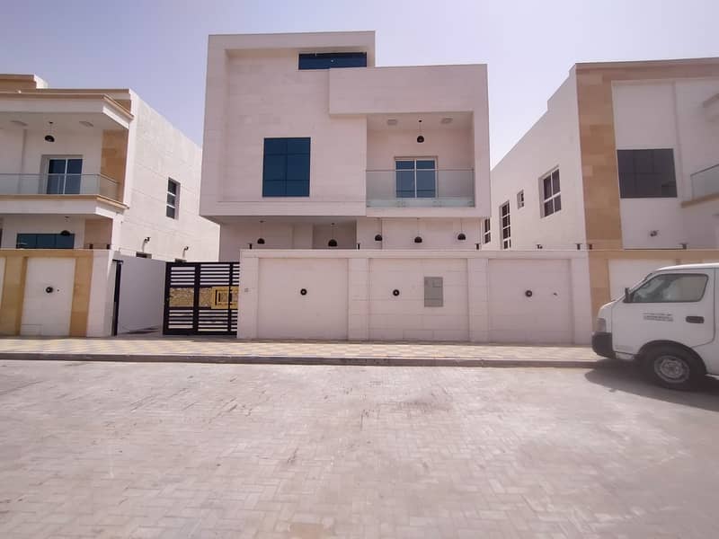 For sale villa, super deluxe finishing, modern European design, the villa in front of Mohammed bin Zayed Street, the villa in a very special location