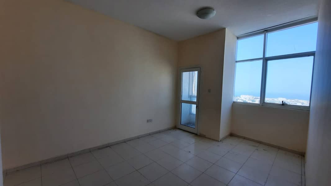 For sale one-bedroom apartment with balcony and two bathrooms Open views of the lake and close to restaurants and shopping centers Al Majaz 3