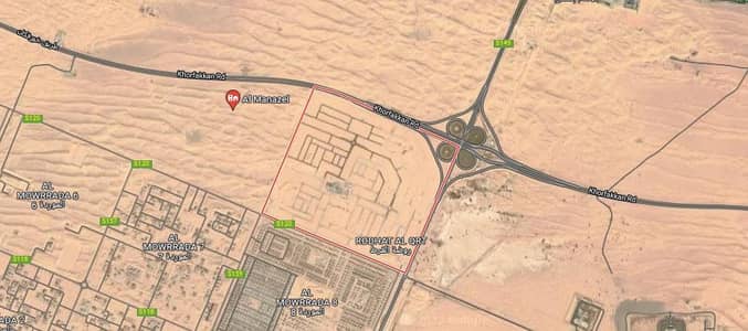 Mixed Use Land for Sale in Rodhat Al Qrt, Sharjah - Residential/commercial land for sale in Rawdat Al Qurt area