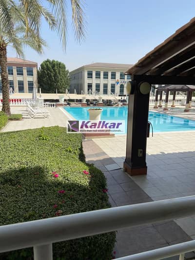 Studio for Rent in Green Community, Dubai - Lake Apartments, ( Green Community ), Un furnished  Studio with Pool View with Large 2 Storage space available for Rent