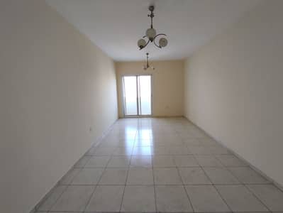 Super Offier 1 Month + Gym,poll + Maintenance Free 2. Bhk Rent 28k Master Room Hall with balcony Building opposite Sahara Mall in Al Nahda Sharjah