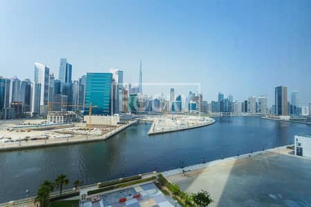 Office for Sale in Business Bay, Dubai - Fitted | With Partition | Full Canal View